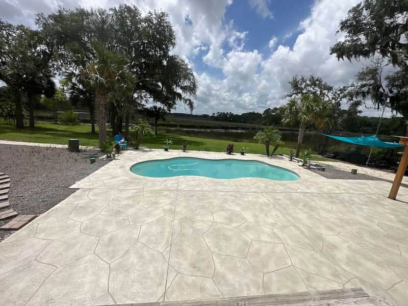 ongoing-outdoor-pool-decorative-concrete-pool-deck-resurfacing